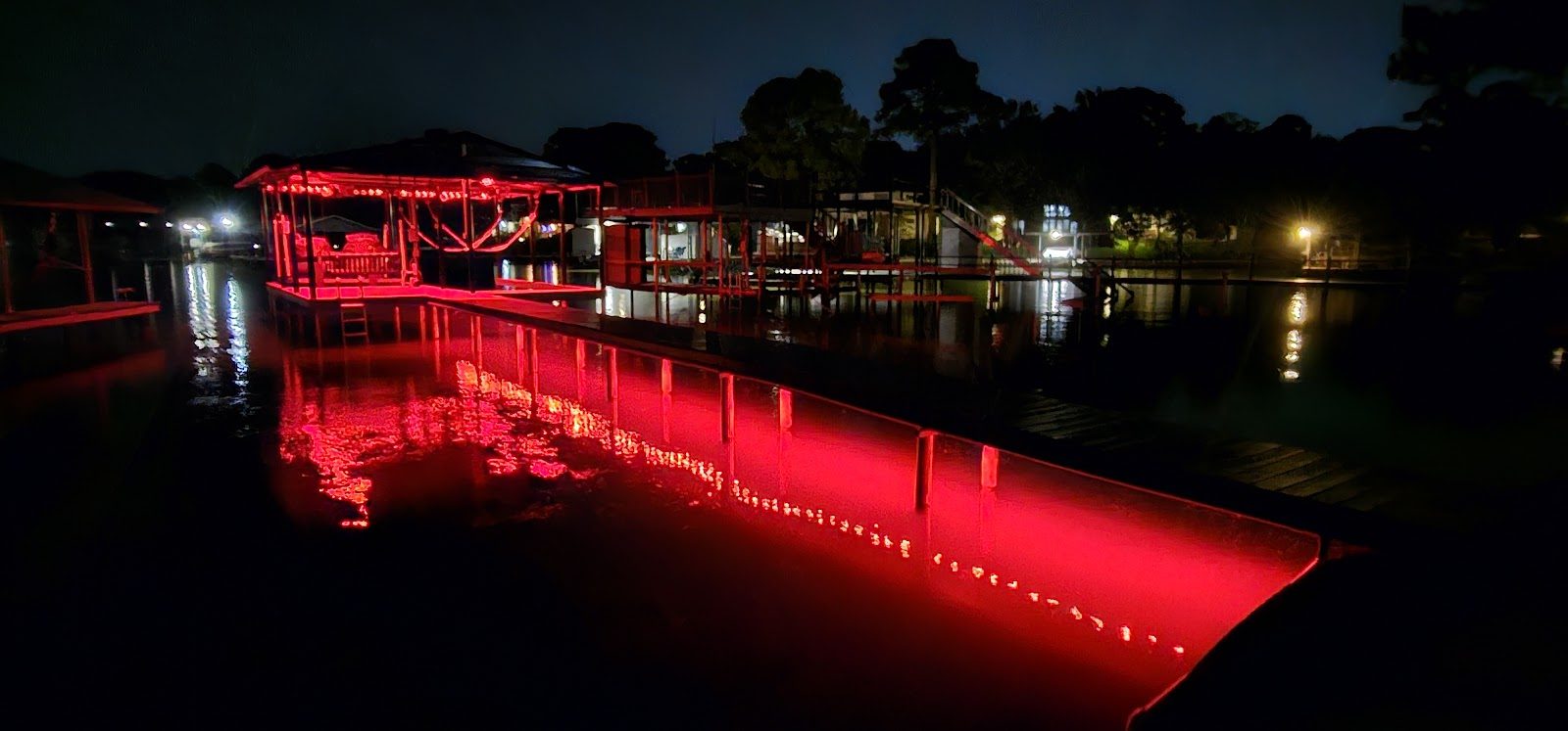 Boathouse lit deep red